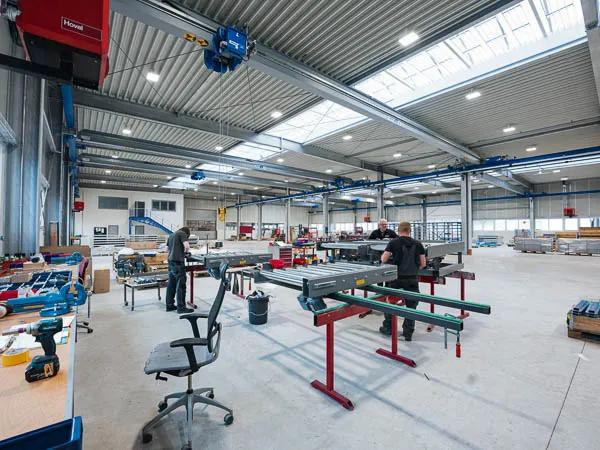 HÖRMANN Gruppe Klatt Fördertechnik – Holzpaketförderanlagen